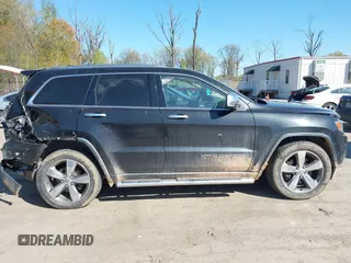 2014 Jeep Grand Cherokee Limited with VIN 1C4RJFBT3EC195354, listed as a IAAI auction lot 42031013 with 168,304 mi miles and . Bid and sale history available at DreamBid. Image 13.