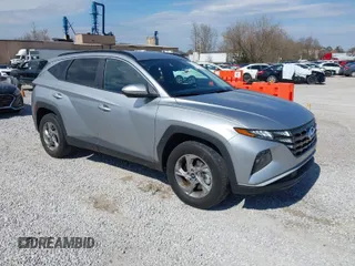 2022 Hyundai Tucson SEL z VIN 5NMJBCAE5NH157928, wystawiony jako IAAI lot #41874386 z przebiegiem 29 155 mil mil oraz . Historia ofert i sprzedaży dostępna na DreamBid. Obrazek 1.