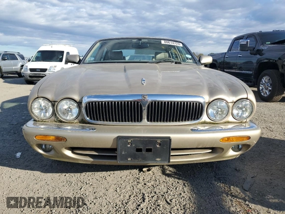 1998 Jaguar XJ with VIN SAJHX1248WC853422, listed as a Copart auction lot 80614724 with 76,269 mi miles and Non repairable. Bid and sale history available at DreamBid. Image 5.