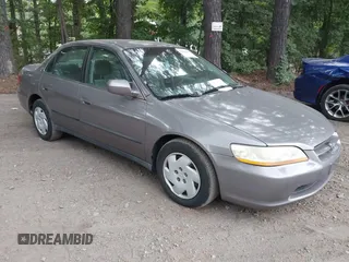 2000 Honda Accord LX with VIN 1HGCG1641YA002811, listed as a IAAI auction lot 42606402 with 217,212 mi miles and . Bid and sale history available at DreamBid. Image 1.