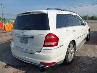 2011 Mercedes-Benz GL-Class GL 450 with VIN 4JGBF7BE1BA709277, listed as a IAAI auction lot 42163011 with 140,130 mi miles. Bid and sale history available at carsss.com. Image 4.