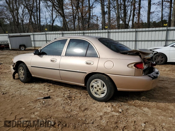 1999 Ford Escort LX with VIN 1FAFP10P6XW151186, listed as a Copart auction lot 43330275 with 88,655 mi miles and Salvage Title. Bid and sale history available at DreamBid. Image 2.