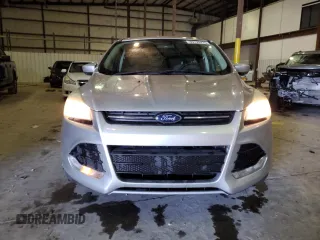 2013 Ford Escape SE с VIN 1FMCU0GX3DUB89970, выставлен на аукционе Copart как лот 89129775 с пробегом 141 223 миль миль и На запчасти • Non repairable. История ставок и продаж доступна на DreamBid. Изображение 5.