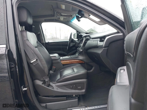 2016 Chevrolet Tahoe LTZ with VIN 1GNSKCKC2GR104305, listed as a IAAI auction lot 41697868 with 124,670 mi miles. Bid and sale history available at carsss.com. Image 5.