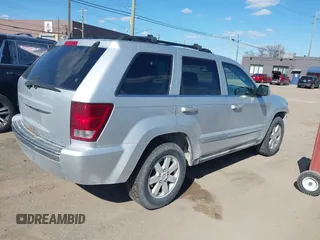 2009 Jeep Grand Cherokee Limited with VIN 1J8GR58K49C549633, listed as a IAAI auction lot 42050074 with 137,586 mi miles and . Bid and sale history available at DreamBid. Image 4.
