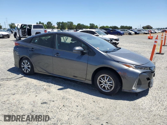 2021 Toyota Prius LE z VIN JTDKAMFPXM3190346, wystawiony jako Copart lot #57626675 z przebiegiem 102 786 mil mil oraz Szkoda całkowita • Salvage title. Historia ofert i sprzedaży dostępna na DreamBid. Obrazek 4.