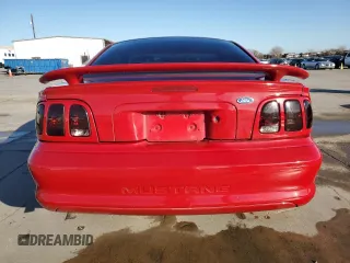 1996 Ford Mustang with VIN 1FALP4041TF234741, listed as a Copart auction lot 85277894 with 113,353 mi miles and Salvage Title. Bid and sale history available at carsss.com. Image 6.