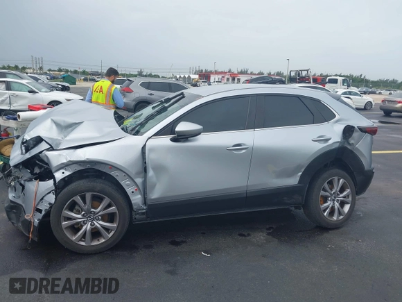 2021 Mazda CX-30 Select with VIN 3MVDMBBLXMM246600, listed as a IAAI auction lot 42418629 with 77,713 mi miles and . Bid and sale history available at DreamBid. Image 6.