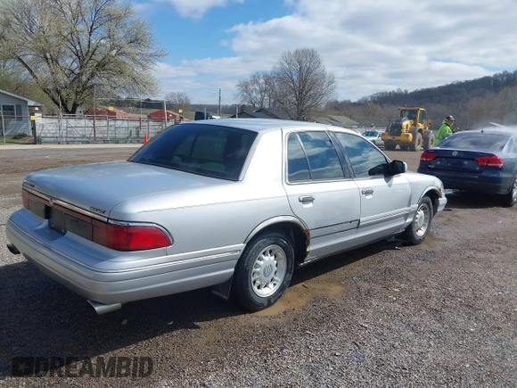 1997 Mercury Grand Marquis LS with VIN 2MELM75W3VX717801, listed as a IAAI auction lot 41920075 with 173,730 mi miles and . Bid and sale history available at DreamBid. Image 4.