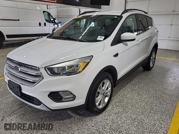 2018 Ford Escape SE z VIN 1FMCU9GD4JUA76194, wystawiony jako IAAI lot #42421138 z przebiegiem 47 896 mil mil oraz . Historia ofert i sprzedaży dostępna na DreamBid. Obrazek 13.