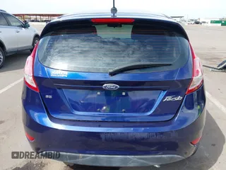 2016 Ford Fiesta SE with VIN 3FADP4EJ4GM199945, listed as a IAAI auction lot 41881260 with 98,945 mi miles. Bid and sale history available at carsss.com. Image 16.