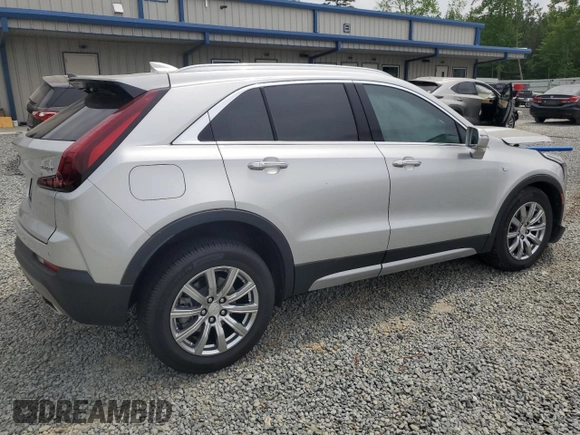 2021 Cadillac XT4 FWD Premium Luxury z VIN 1GYFZCR40MF000293, wystawiony jako Copart lot #58710565 z przebiegiem 49 721 mil mil oraz Szkoda całkowita • Salvage title. Historia ofert i sprzedaży dostępna na DreamBid. Obrazek 3.