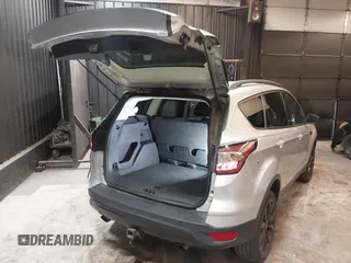 2018 Ford Escape SE z VIN 1FMCU9GD0JUD33111, wystawiony jako IAAI lot #42277404 z przebiegiem 71 896 mil mil oraz . Historia ofert i sprzedaży dostępna na DreamBid. Obrazek 4.
