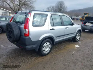 2005 Honda CR-V LX with VIN JHLRD78535C042479, listed as a IAAI auction lot 41682963 with 216,777 mi miles. Bid and sale history available at carsss.com. Image 4.