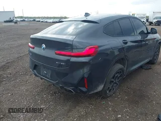 2023 BMW X4 xDrive30i with VIN 5UX33DT01P9N66552, listed as a IAAI auction lot 42103350 with 56,303 mi miles and . Bid and sale history available at DreamBid. Image 4.