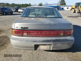 1992 Toyota Camry LE with VIN 4T1SK12E3NU104088, listed as a Copart auction lot 47496735 with 174,957 mi miles and Salvage Title. Bid and sale history available at carsss.com. Image 6.