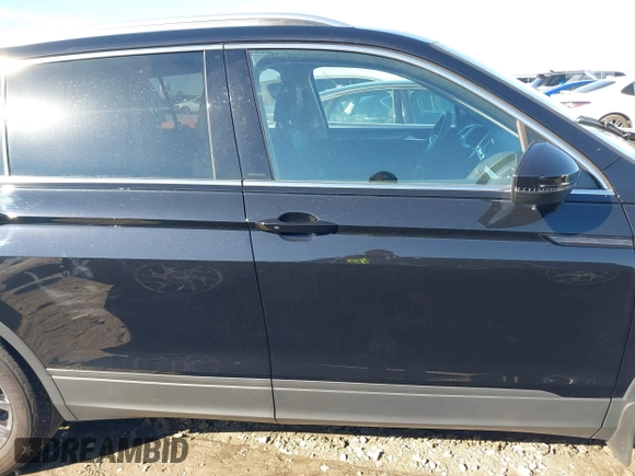 2023 Volkswagen Tiguan SE z VIN 3VVMB7AX7PM032629, wystawiony jako IAAI lot #41441468 z przebiegiem 52 518 mil mil oraz . Historia ofert i sprzedaży dostępna na DreamBid. Obrazek 13.