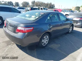 2007 Toyota Camry CE with VIN JTNBE46K273074924, listed as a IAAI auction lot 41598508 with 85,469 mi miles. Bid and sale history available at carsss.com. Image 4.