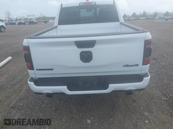2023 Ram 1500 Laramie with VIN 1C6SRFJT3PN541901, listed as a IAAI auction lot 42156766 with 58,082 mi miles and . Bid and sale history available at DreamBid. Image 16.