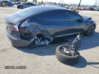 2025 Tesla Model 3 Long Range z VIN 5YJ3E1EB0SF986178, wystawiony jako Copart lot #57612115 z przebiegiem Nie podano mil oraz Szkoda całkowita • Salvage title. Historia ofert i sprzedaży dostępna na DreamBid. Obrazek 3.