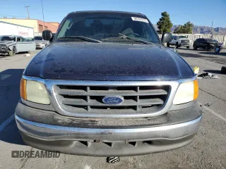 2004 Ford F-150 XL z VIN 2FTRF07274CA23500, wystawiony jako Copart lot #88761275 z przebiegiem 257 573 mil mil oraz Szkoda całkowita • Salvage title. Historia ofert i sprzedaży dostępna na DreamBid. Obrazek 5.