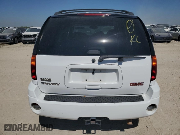 2007 GMC Envoy SLE with VIN 1GKDS13S172290928, listed as a Copart auction lot 74128924 with 119,282 mi miles and Salvage Title. Bid and sale history available at carsss.com. Image 6.