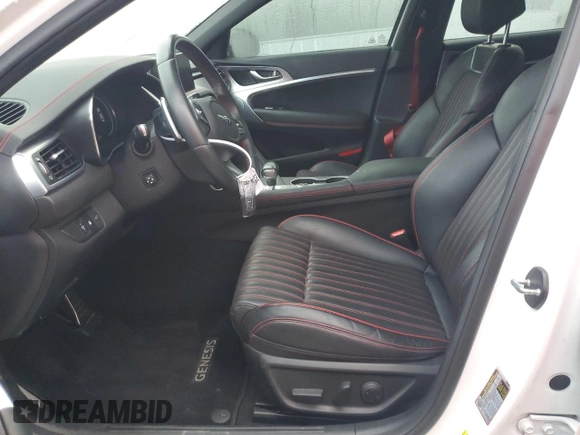 2023 Genesis G70 2.0T with VIN KMTG34TA4PU104576, listed as a Copart auction lot 85082044 with 28,821 mi miles and Salvage Title. Bid and sale history available at DreamBid. Image 7.