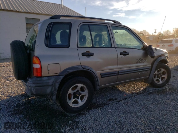 2002 Chevrolet Tracker ZR2 with VIN 2CNBJ734826902012, listed as a Copart auction lot 79226854 with 80,460 mi miles and Salvage title. Bid and sale history available at DreamBid. Image 3.