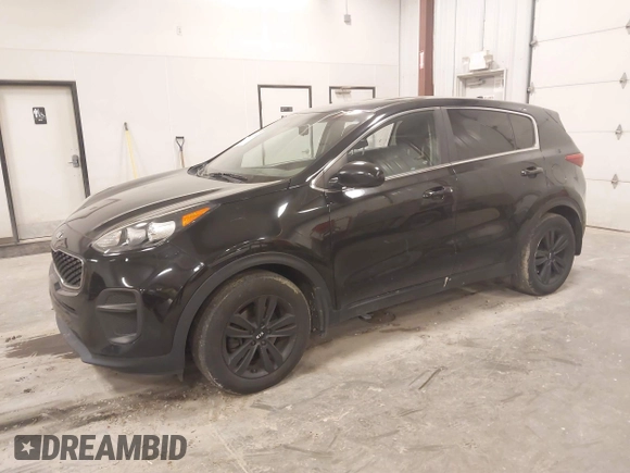 2018 Kia Sportage LX with VIN KNDPM3AC6J7417371, listed as a IAAI auction lot 41879390 with 112,944 mi miles and . Bid and sale history available at carsss.com. Image 2.
