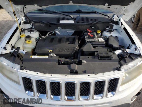 2011 Jeep Compass with VIN 1J4NT1FB8BD138161, listed as a Copart auction lot 73679894 with 199,735 mi miles and Salvage Title. Bid and sale history available at carsss.com. Image 11.