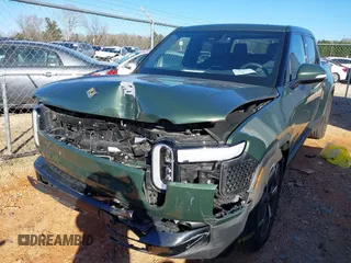 2022 Rivian R1T Adventure Package with VIN 7FCTGAAA2NN006098, listed as a IAAI auction lot 41172815 with 1 mi miles. Bid and sale history available at carsss.com. Image 6.