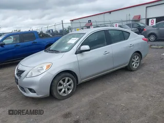 2012 Nissan Versa SV with VIN 3N1CN7AP6CL823626, listed as a IAAI auction lot 42662967 with 150,849 mi miles and . Bid and sale history available at DreamBid. Image 2.