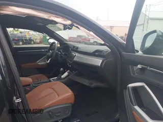 2021 Audi Q3 S line Premium with VIN WA1DECF36M1031852, listed as a IAAI auction lot 42020471 with 29,445 mi miles and . Bid and sale history available at DreamBid. Image 5.