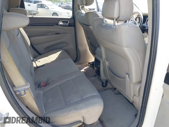 2011 Jeep Grand Cherokee Laredo with VIN 1J4RS4GG5BC573337, listed as a IAAI auction lot 41960369 with 185,518 mi miles and . Bid and sale history available at DreamBid. Image 8.