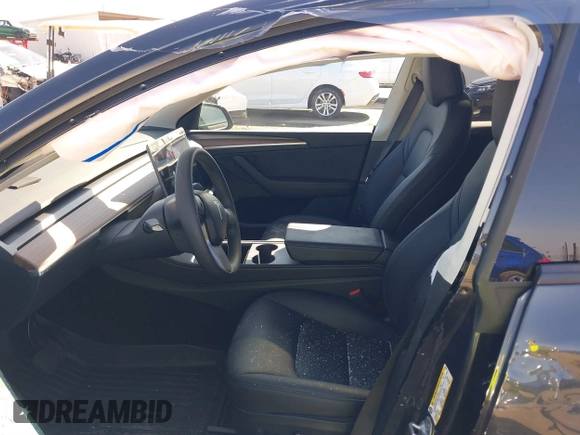 2024 Tesla Model Y with VIN 7SAYGDED8RF213796, listed as a IAAI auction lot 41634130 with 7,710 mi miles and . Bid and sale history available at DreamBid. Image 5.