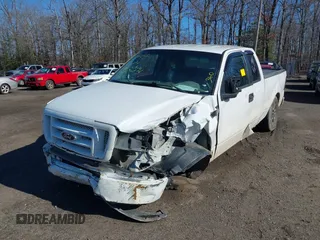 2005 Ford F-150 STX with VIN 1FTRX12W35NA09781, listed as a IAAI auction lot 41846576 with 231,784 mi miles. Bid and sale history available at carsss.com. Image 2.
