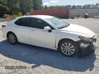 2020 Toyota Camry LE with VIN 4T1L11AK6LU900443, listed as a Copart auction lot 72664744 with 106,317 mi miles and Salvage Title. Bid and sale history available at DreamBid. Image 4.
