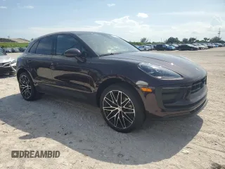 2024 Porsche Macan with VIN WP1AA2A53RLB14849, listed as a Copart auction lot 57979155 with 10,031 mi miles and Salvage title. Bid and sale history available at DreamBid. Image 4.