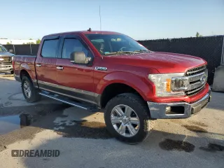 2019 Ford F-150 XL with VIN 1FTEW1E48KFA78516, listed as a Copart auction lot 65382775 with 70,810 mi miles and Salvage title. Bid and sale history available at DreamBid. Image 4.