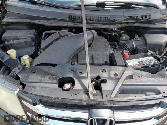 2014 Honda Odyssey Touring with VIN 5FNRL5H94EB057499, listed as a IAAI auction lot 41983956 with 158,573 mi miles and . Bid and sale history available at DreamBid. Image 10.