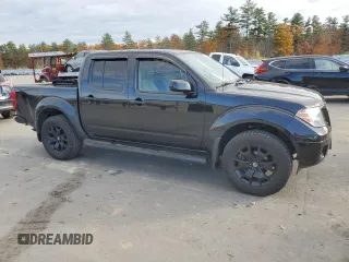 2020 Nissan Frontier Pro-4X with VIN 1N6ED0EB3LN710650, listed as a Copart auction lot 77419464 with 97,399 mi miles and Salvage title. Bid and sale history available at DreamBid. Image 4.