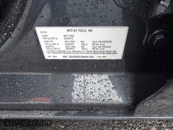 2024 Tesla Model Y Long Range with VIN 7SAYGDEE5RA241433, listed as a IAAI auction lot 41569277 with 7,490 mi miles. Bid and sale history available at carsss.com. Image 9.