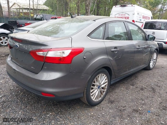2012 Ford Focus SEL with VIN 1FAHP3H23CL348356, listed as a IAAI auction lot 42041001 with 174,510 mi miles. Bid and sale history available at carsss.com. Image 4.