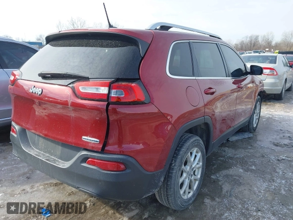 2015 Jeep Cherokee Latitude with VIN 1C4PJLCB8FW612284, listed as a IAAI auction lot 41578838 with 101,458 mi miles and . Bid and sale history available at DreamBid. Image 4.