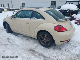 2019 Volkswagen Beetle S with VIN 3VWFD7AT1KM703684, listed as a IAAI auction lot 41571691 with 111,180 mi miles. Bid and sale history available at carsss.com. Image 3.