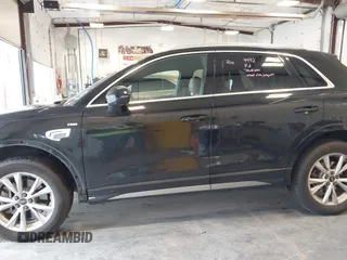 2021 Audi Q3 S line Premium Plus with VIN WA1EECF32M1054629, listed as a IAAI auction lot 41588322 with 33,385 mi miles and . Bid and sale history available at DreamBid. Image 15.