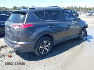 2018 Toyota RAV4 XLE with VIN 2T3WFREV9JW503136, listed as a IAAI auction lot 41815266 with 118,585 mi miles. Bid and sale history available at carsss.com. Image 4.