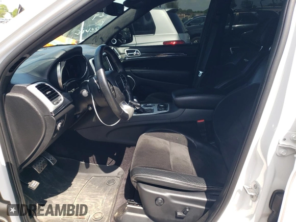 2018 Jeep Grand Cherokee with VIN NJ1449E, listed as a Copart auction lot 51357834 with 32,619 mi miles and Salvage title. Bid and sale history available at DreamBid. Image 7.