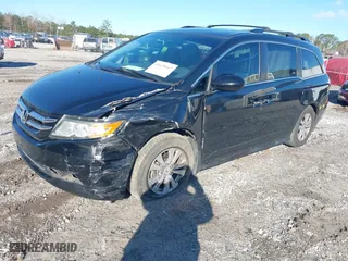 2016 Honda Odyssey EX-L with VIN 5FNRL5H63GB050617, listed as a IAAI auction lot 41678167 with 128,000 mi miles. Bid and sale history available at carsss.com. Image 17.
