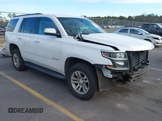 2020 Chevrolet Tahoe LS with VIN 1GNSCAKC6LR197289, listed as a IAAI auction lot 41429866 with 127,071 mi miles and . Bid and sale history available at DreamBid. Image 1.